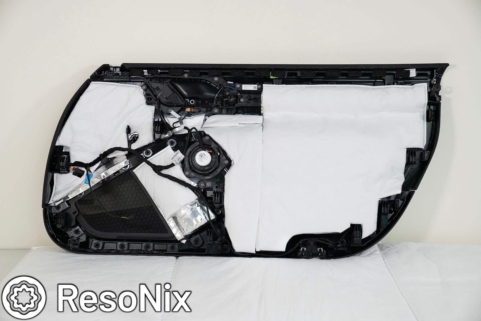 Porsche 911 Door Panel with ResoNix Sound Solutions Mega CLD Squares sound deadening material, and Fiber Mat sound absorbing and thermal insulation material installed in order to reduce resonance, wind noise, and tire noise for a quieter ride and better sound system performance
