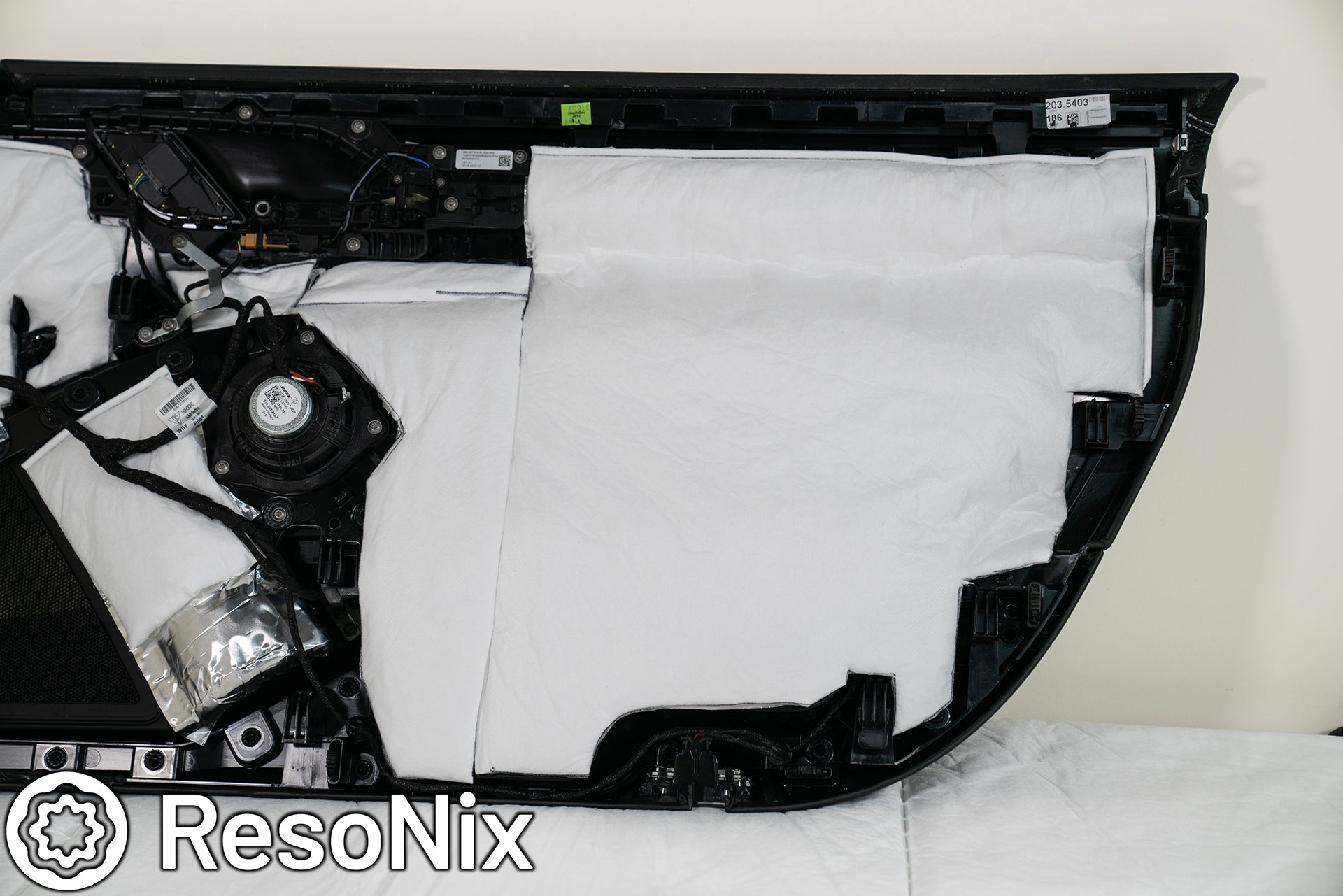 Porsche 911 Door Panel with ResoNix Sound Solutions Mega CLD Squares sound deadening material, and Fiber Mat sound absorbing and thermal insulation material installed in order to reduce resonance, wind noise, and tire noise for a quieter ride and better sound system performance