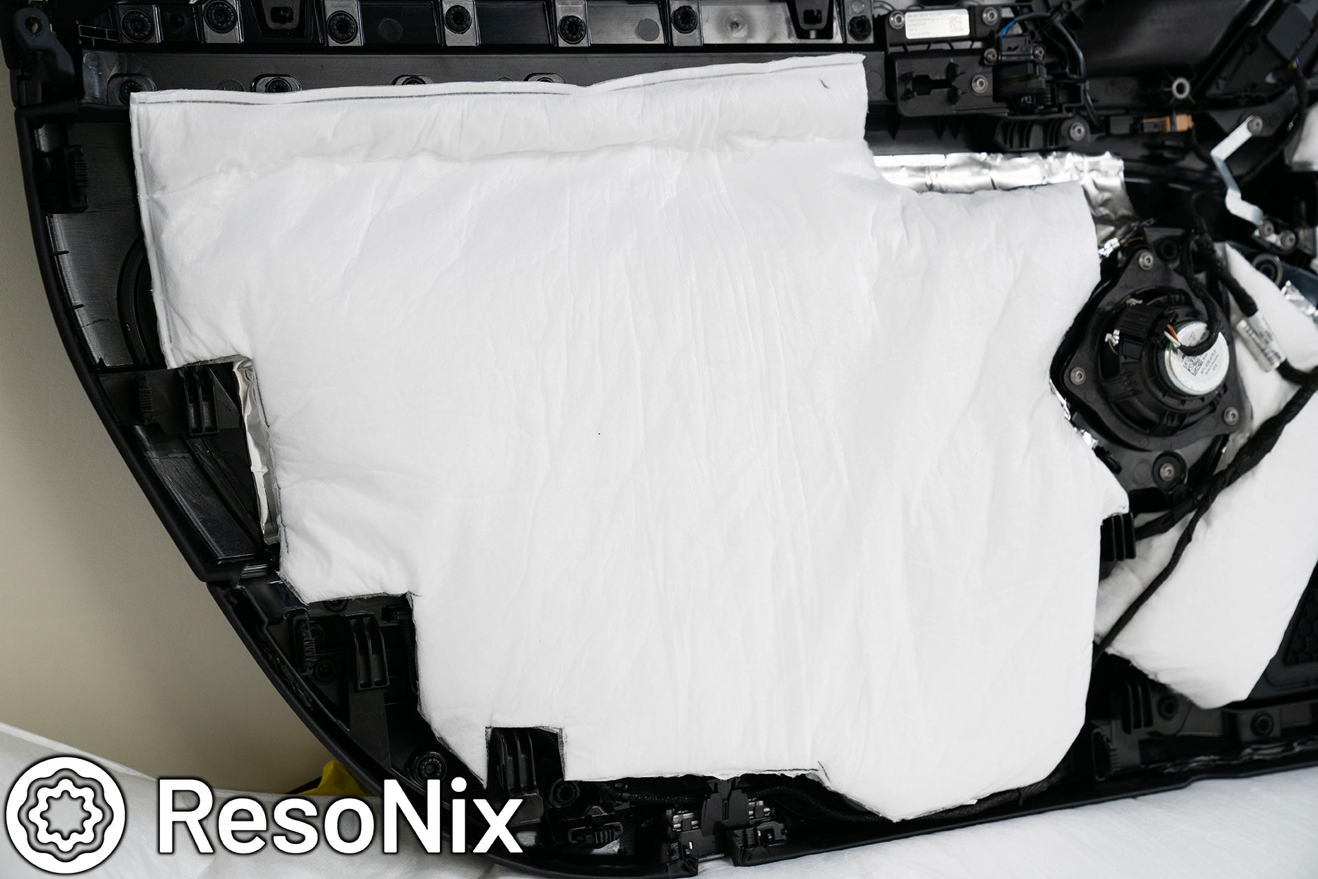 Porsche 911 Door Panel with ResoNix Sound Solutions Mega CLD Squares sound deadening material, and Fiber Mat sound absorbing and thermal insulation material installed in order to reduce resonance, wind noise, and tire noise for a quieter ride and better sound system performance