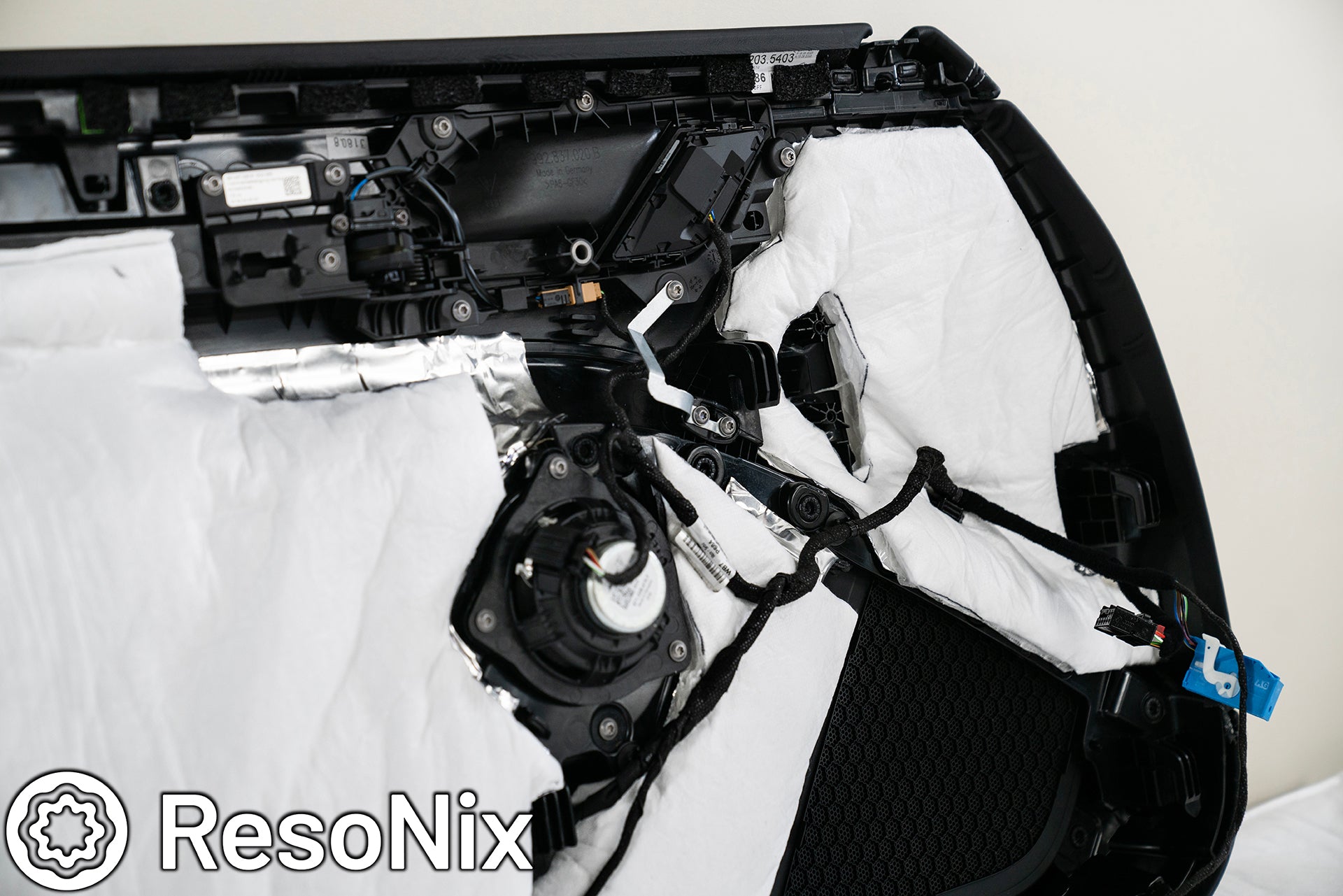 Porsche 911 Door Panel with ResoNix Sound Solutions Mega CLD Squares sound deadening material, and Fiber Mat sound absorbing and thermal insulation material installed in order to reduce resonance, wind noise, and tire noise for a quieter ride and better sound system performance