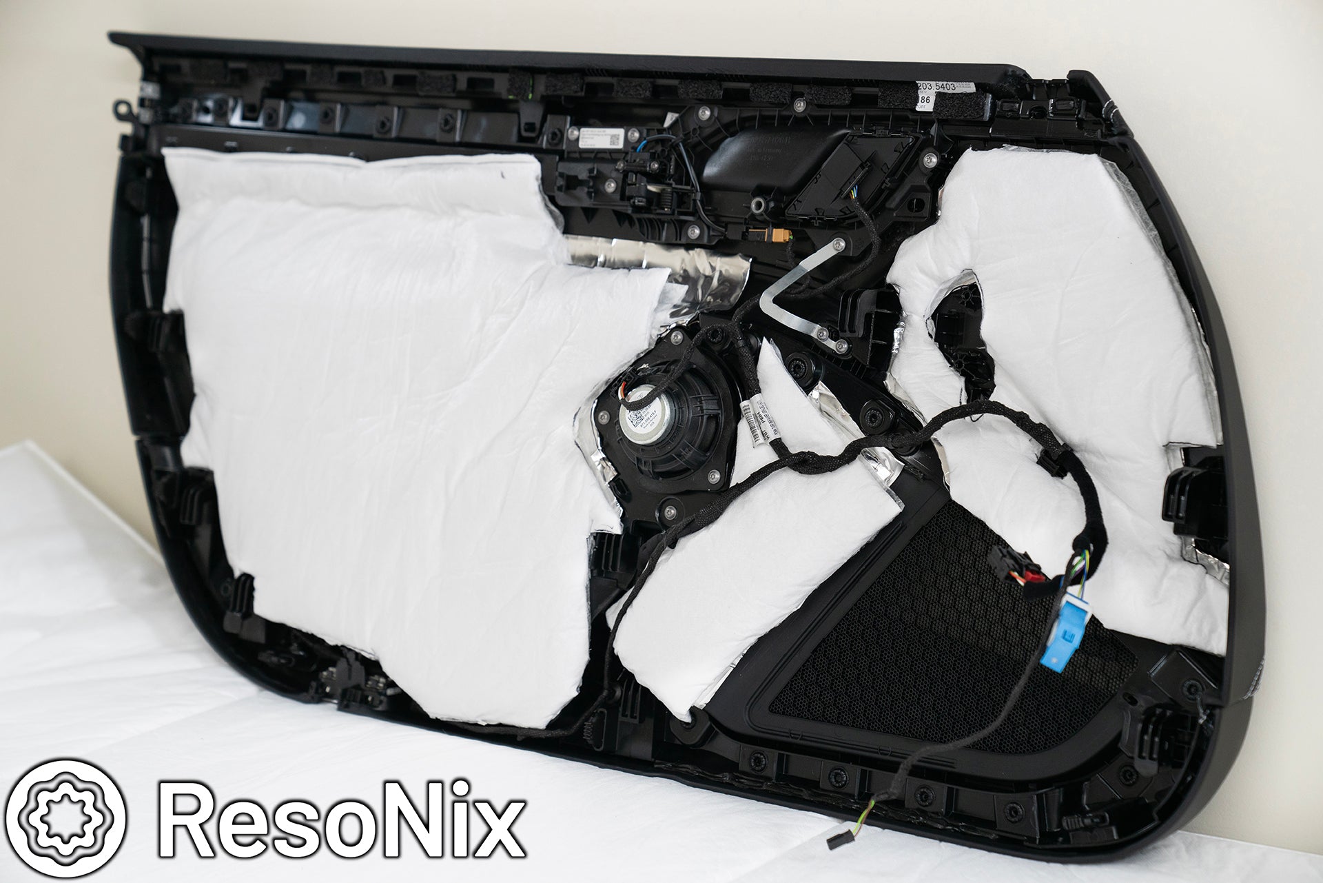Porsche 911 Door Panel with ResoNix Sound Solutions Mega CLD Squares sound deadening material, and Fiber Mat sound absorbing and thermal insulation material installed in order to reduce resonance, wind noise, and tire noise for a quieter ride and better sound system performance