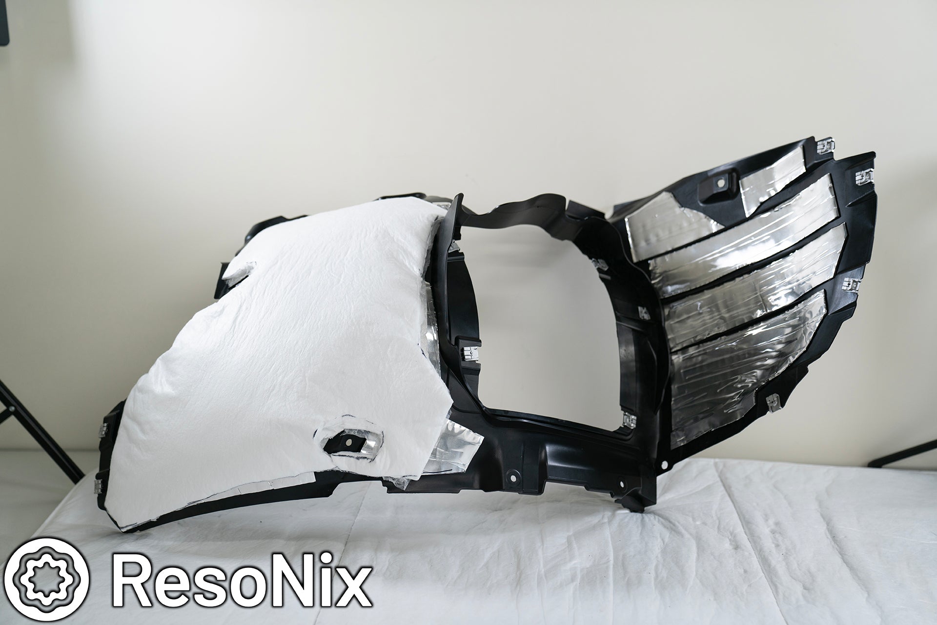 ResoNix Sound Solutions CLD Squares sound deadening material and Fiber Mat sound absorber Installed Onto Porsche 911 Fender Liners To Reduce Road And Tire Noise