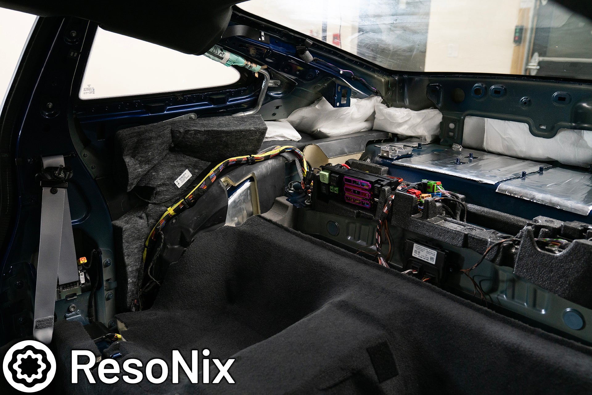 ResoNix Sound Solutions CLD Squares sound deadening material and Fiber Mat sound absorption material installed into the rear interior of a Porsche 992 911 GT3 Touring to reduce road, tire, wind, and exhaust noise