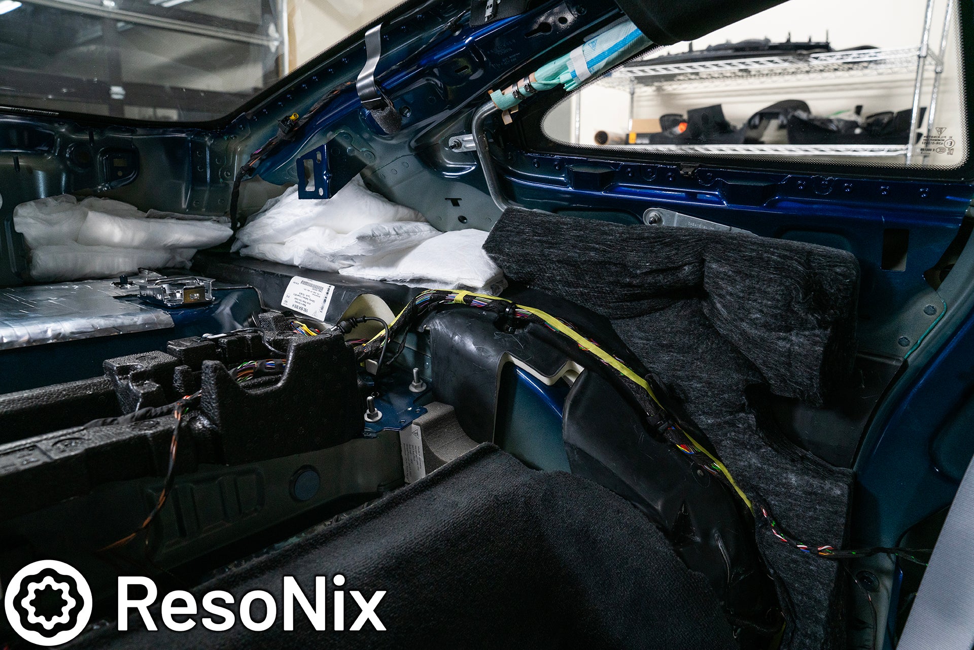 ResoNix Sound Solutions CLD Squares sound deadening material and Fiber Mat sound absorption material installed into the rear interior of a Porsche 992 911 GT3 Touring to reduce road, tire, wind, and exhaust noise