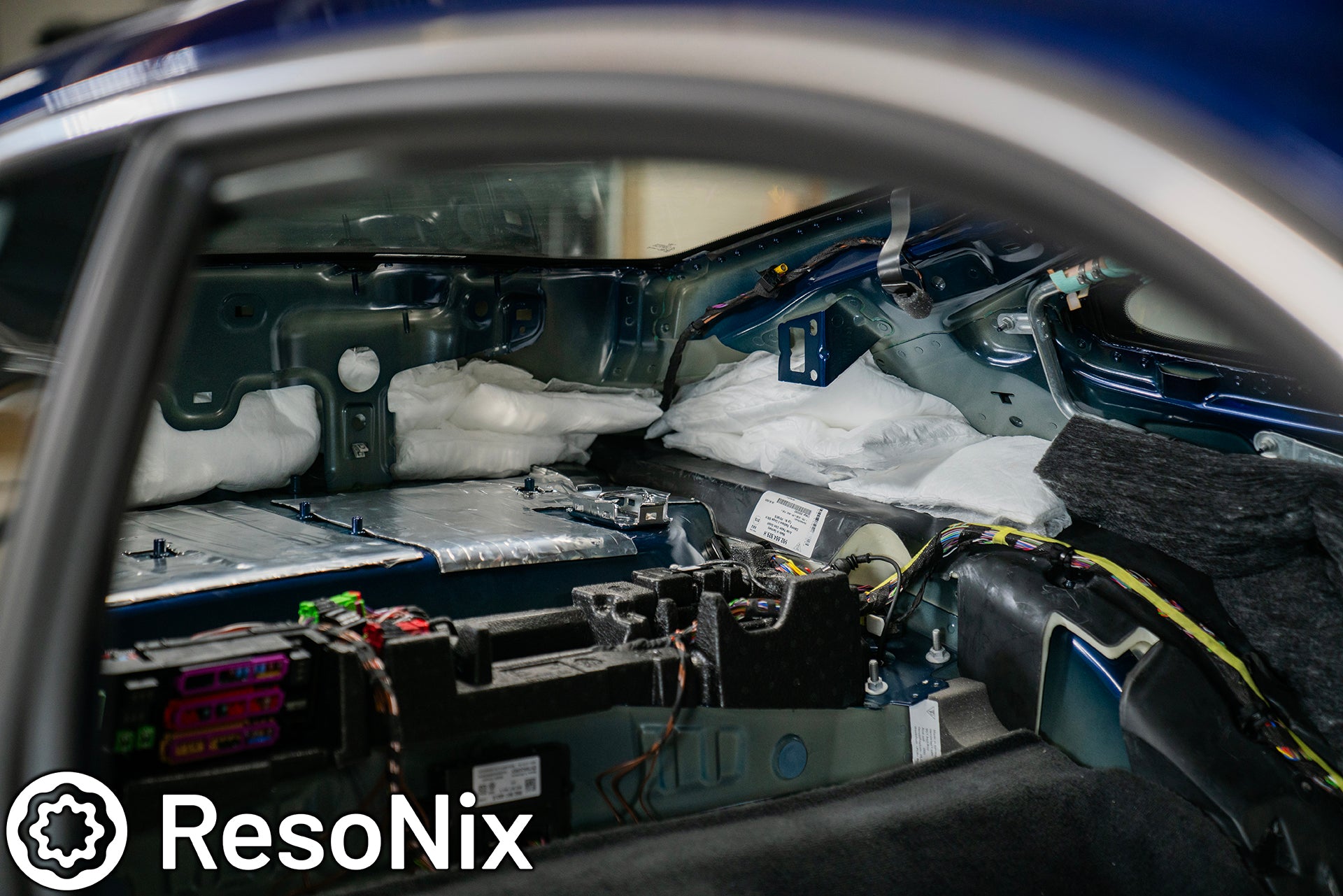ResoNix Sound Solutions CLD Squares sound deadening material and Fiber Mat sound absorption material installed into the rear interior of a Porsche 992 911 GT3 Touring to reduce road, tire, wind, and exhaust noise