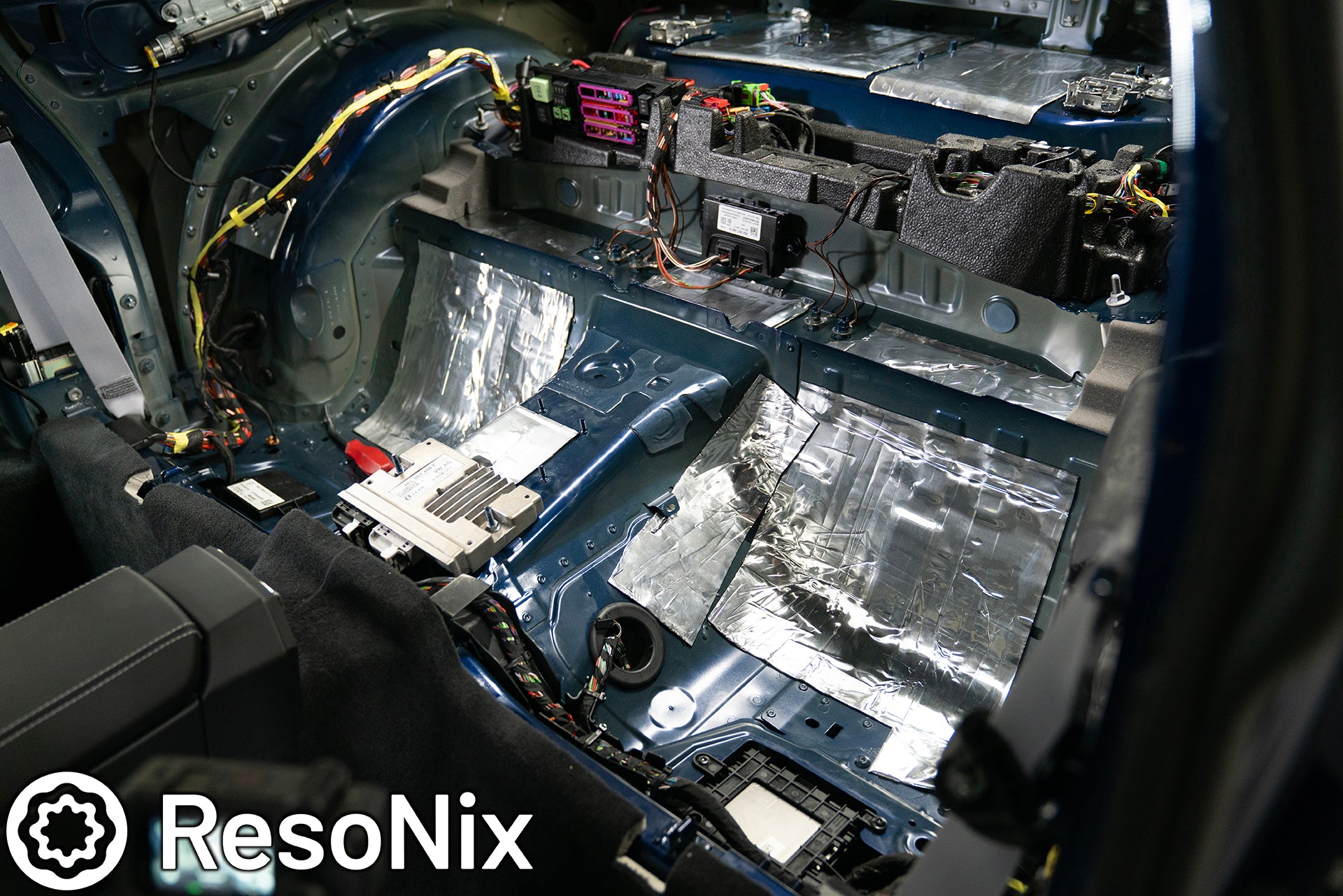 ResoNix Sound Solutions CLD Squares sound deadening material installed into the rear interior of a Porsche 992 911 GT3 Touring to reduce road, tire, wind, and exhaust noise