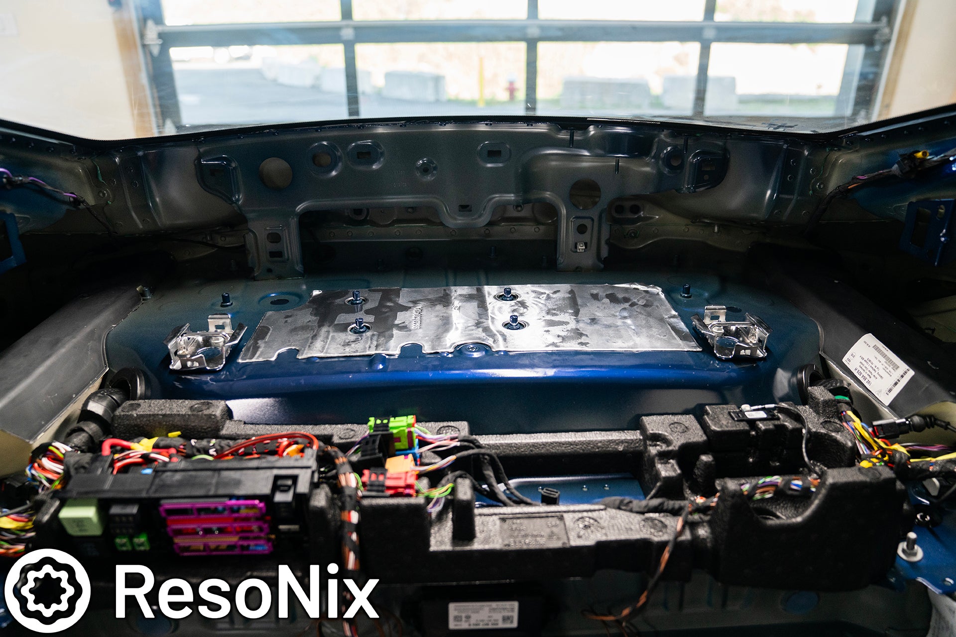 ResoNix Sound Solutions CLD Squares sound deadening material installed into the rear interior of a Porsche 992 911 GT3 Touring to reduce road, tire, wind, and exhaust noise