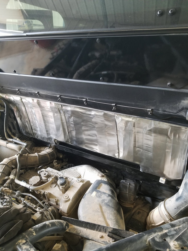 ResoNix Sound Solutions Mega CLD Squares Sound deadening material installed onto the exterior firewall of a Polaris Xpedition to reduce sound from the engine