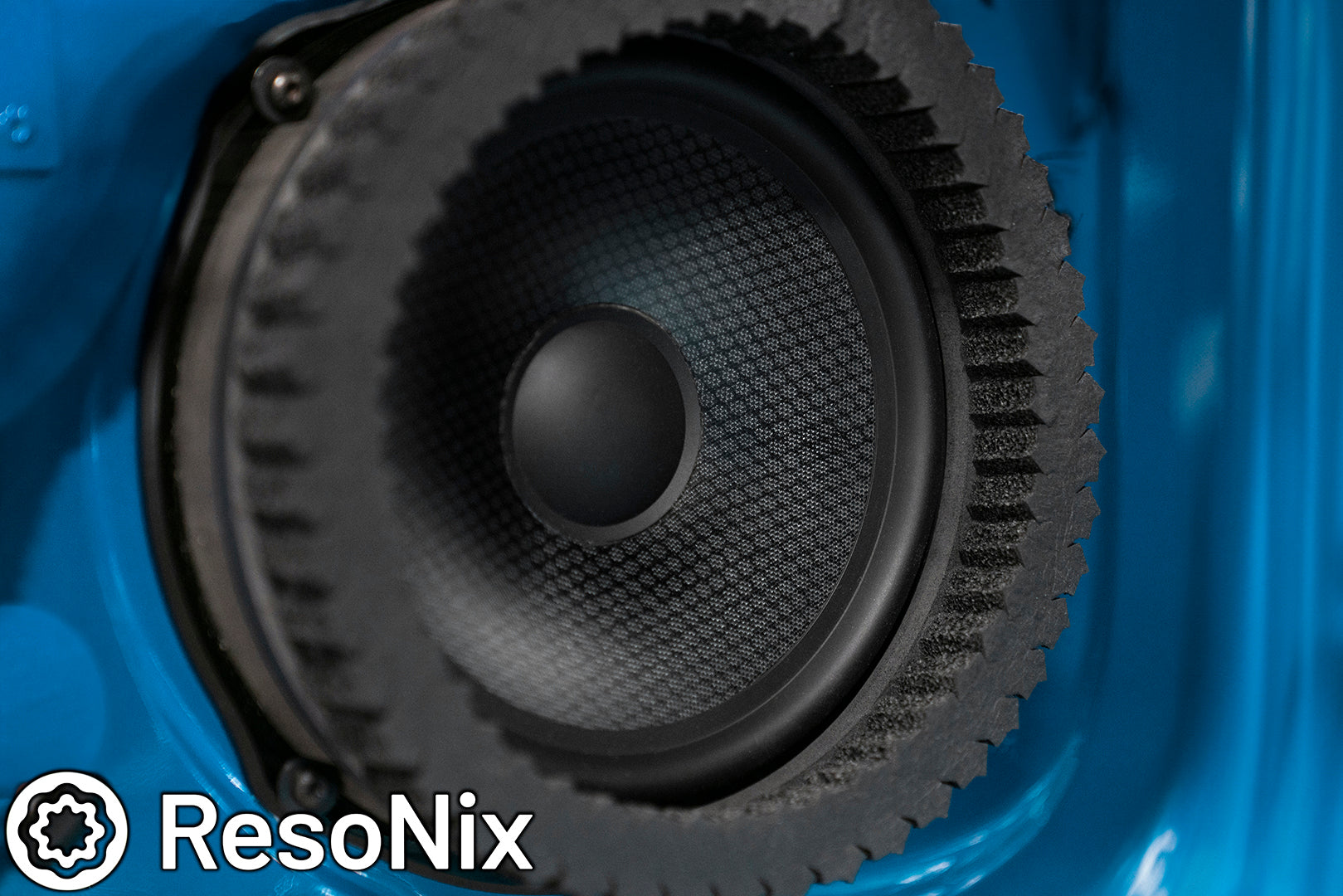 ResoNix Sound Solutions Fast Rings Speaker Foam Ring installed around a car door mounted midbass speaker for better midbass performance