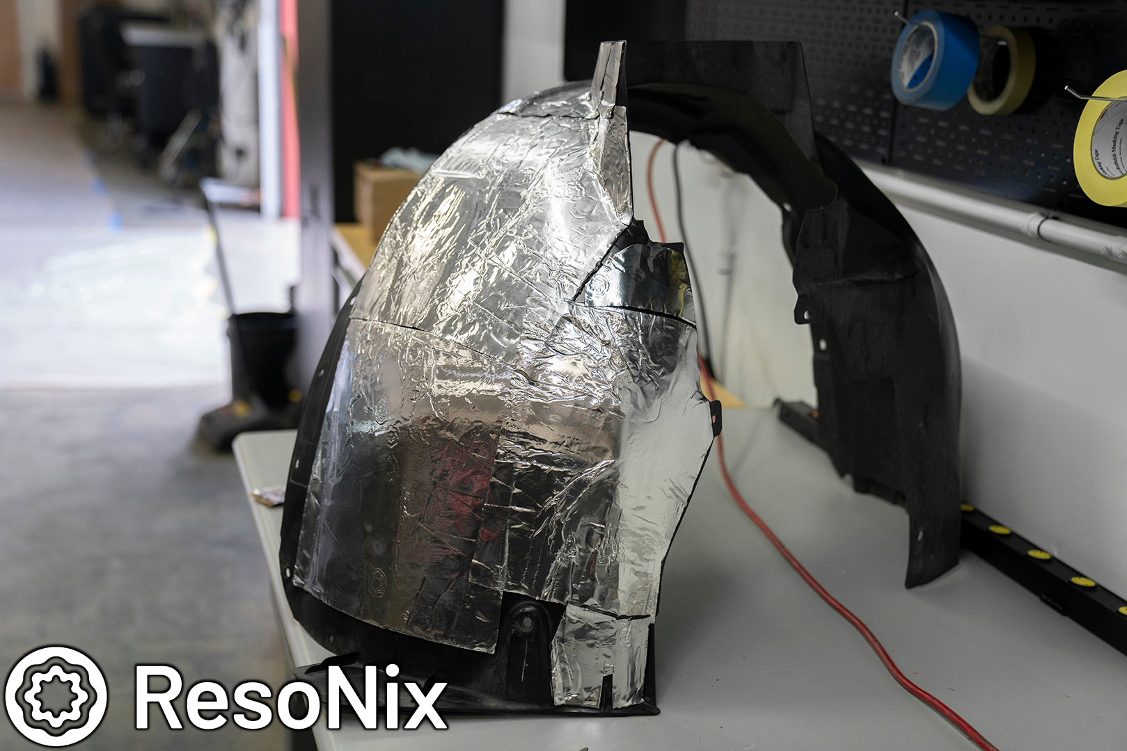 Sound Proofing Wheel Wells with ResoNix Sound Solutions CLD Squares sound deadening material and Fiber Mat automotive sound absorbing material to Reduce Tire Noise, Wind Noise, Road Noise, and Wheel Noise While Driving