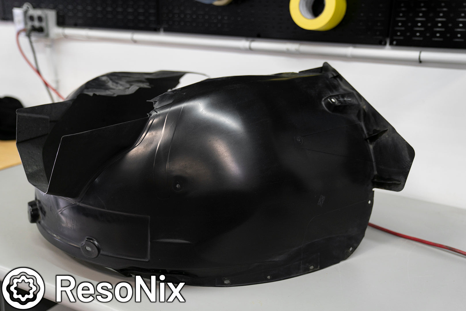 Sound Proofing Wheel Wells with ResoNix Sound Solutions CLD Squares sound deadening material and Fiber Mat automotive sound absorbing material to Reduce Tire Noise, Wind Noise, Road Noise, and Wheel Noise While Driving, before material installation.