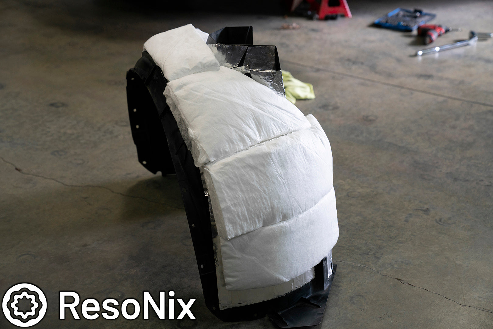 Sound Proofing Wheel Wells with ResoNix Sound Solutions CLD Squares sound deadening material and Fiber Mat automotive sound absorbing material to Reduce Tire Noise, Wind Noise, Road Noise, and Wheel Noise While Driving