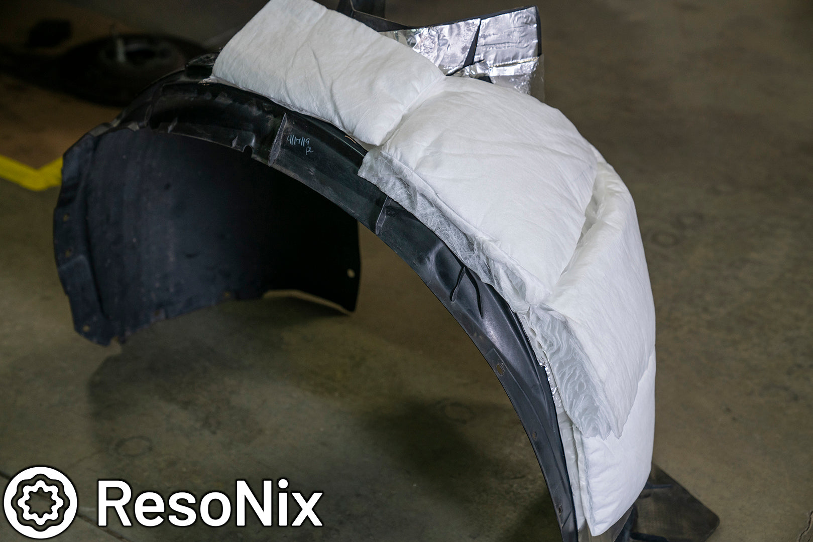 Sound Proofing Wheel Wells with ResoNix Sound Solutions CLD Squares sound deadening material and Fiber Mat automotive sound absorbing material to Reduce Tire Noise, Wind Noise, Road Noise, and Wheel Noise While Driving