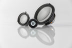 3-way set of Automotive Accuton Ceramic tweeter, midrange, and midbass car audio speakers with white color cones displayed on a reflective surface