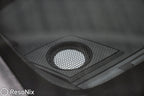 close up of an Accuton Automotive C100AM 3.5" midrange speaker installed into the dash corner of a car