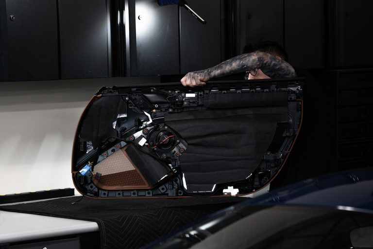 ResoNix Fiber Mat installed onto Porsche 911 GT3 Door Panel