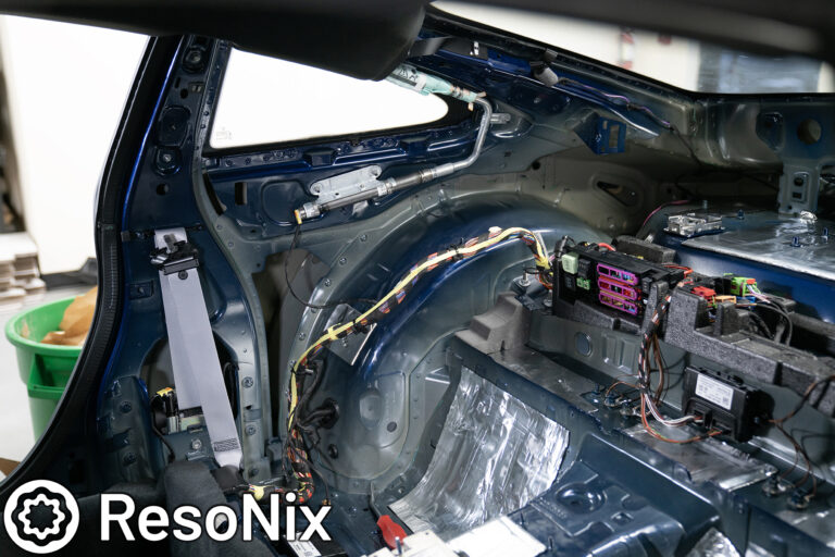 ResoNix Sound Solutions CLD Squares sound deadening material installed into the rear interior of a Porsche 992 911 GT3 Touring to reduce road, tire, wind, and exhaust noise