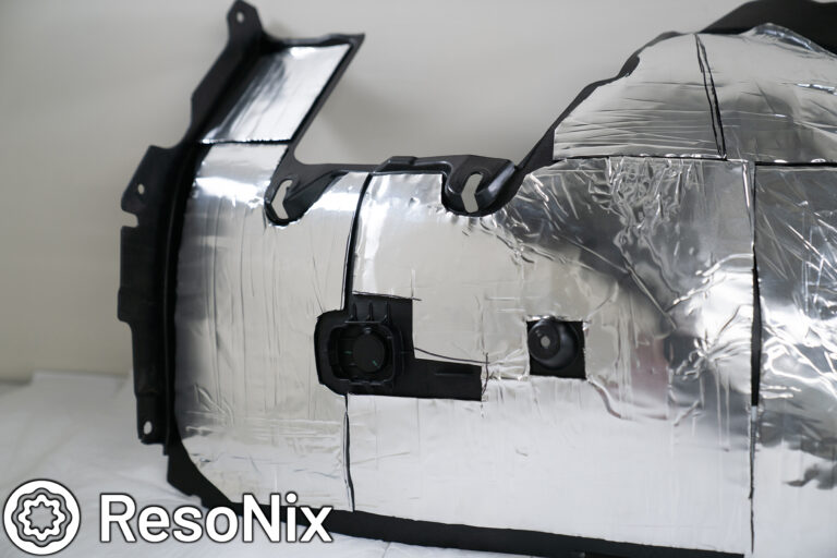 ResoNix Sound Solutions CLD Squares Sound Deadening Material installed onto the fender liners of a Porsche 911 to reduce wind, road, and tire noise